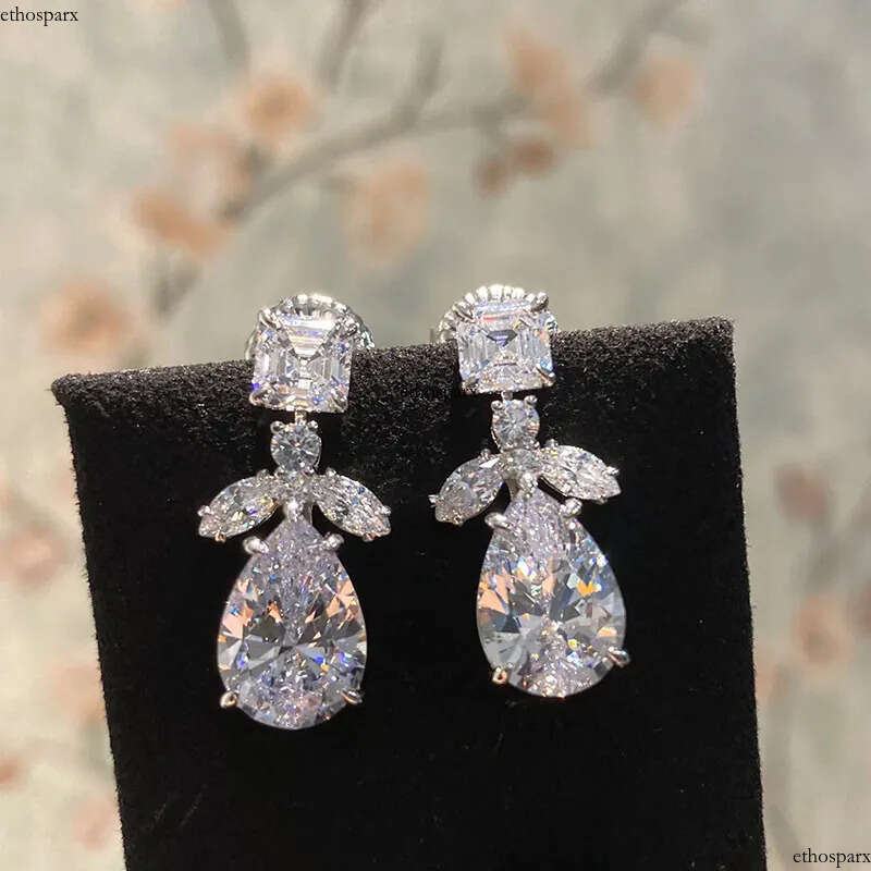 2024 Elegant Sparkling Dangle Earrings Jewelry Sterling Sier Water Drop Pear 5A Cubic Zircon CZ Dia Gemstones Party Eternity Women Earring Gift