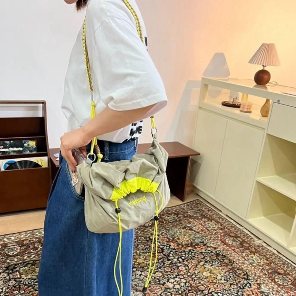 Leisure Lightweight Shoulder Bag Letter Contrast Color Crossbody Bag Large Capacity Nylon Drawstring Bag 251010