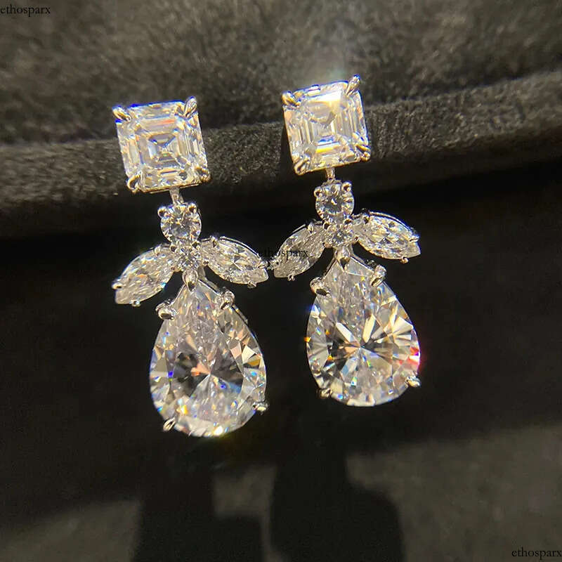 2024 Elegant Sparkling Dangle Earrings Jewelry Sterling Sier Water Drop Pear 5A Cubic Zircon CZ Dia Gemstones Party Eternity Women Earring Gift