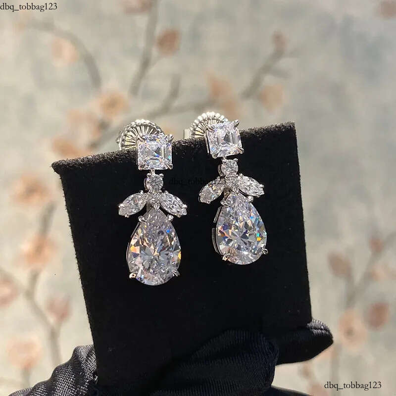 2024 Elegant Sparkling Dangle Earrings Jewelry Sterling Sier Water Drop Pear 5A Cubic Zircon CZ Dia Gemstones Party Eternity Women Earring Gift