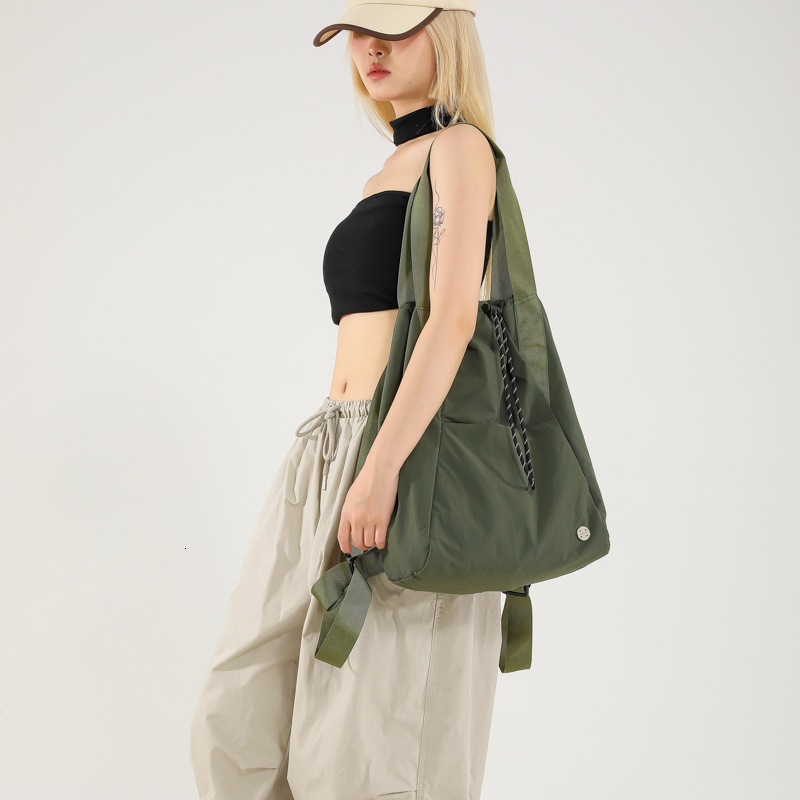 Designer drawstring pocket lightweight nylon shoulder bag 2025 new casual travel sports backpack