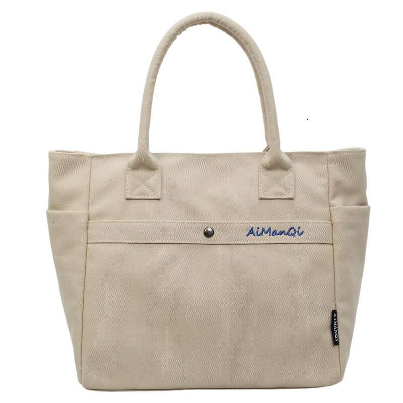 designer bag Luxury bag Large Capacity Commuter Canvas New Fashion Versatile Korean Design Handheld Shoulder Tote Bag