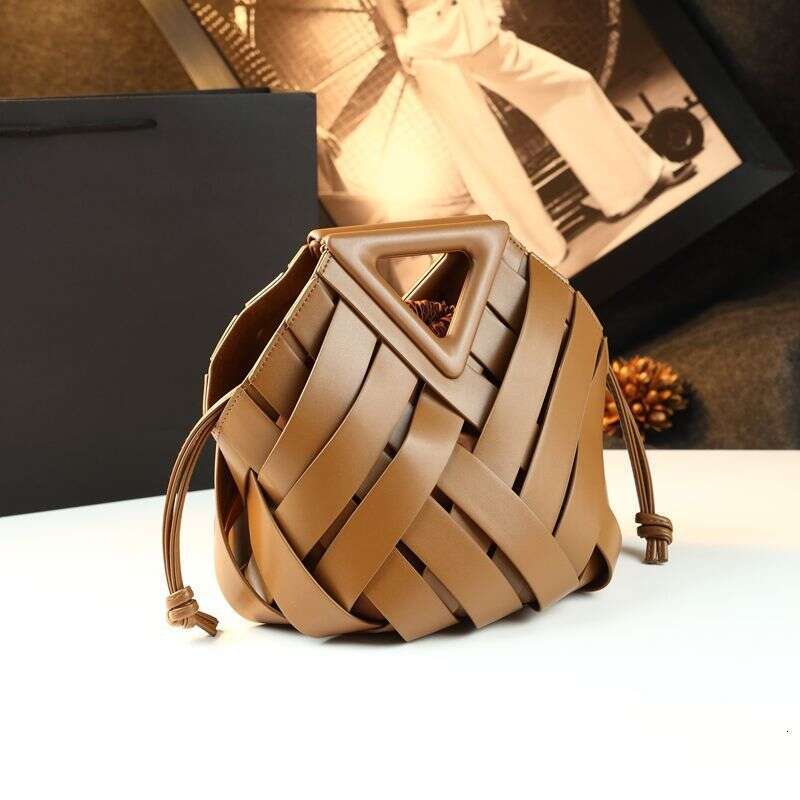 Luxury designer's new vegetable basket bucket leather handbag woven hollow women's fashionable shoulder crossbody bag