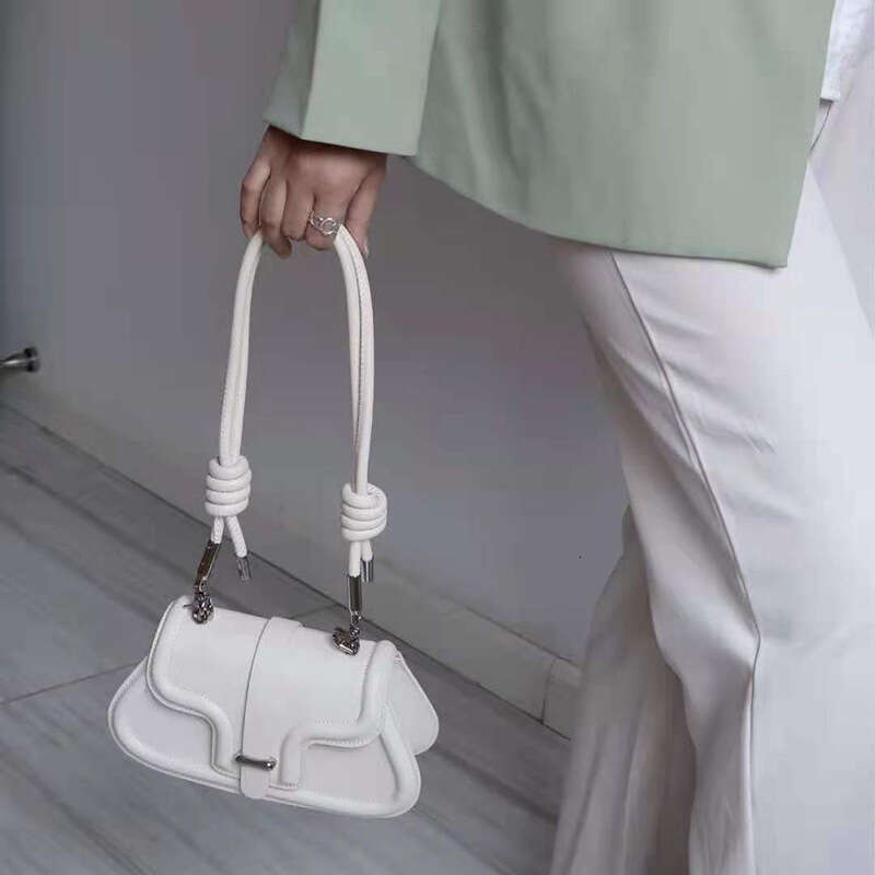 designer bag Luxury bag Women's Niche Design New Fashion Single Shoulder Drawstring Knot Motorcycle Casual Versatile Crossbody Bag for Women