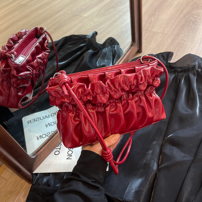 Designer bags pink portable shoulder bag women's 2024 summer new fashion versatile pleated cloud chain messenger bag