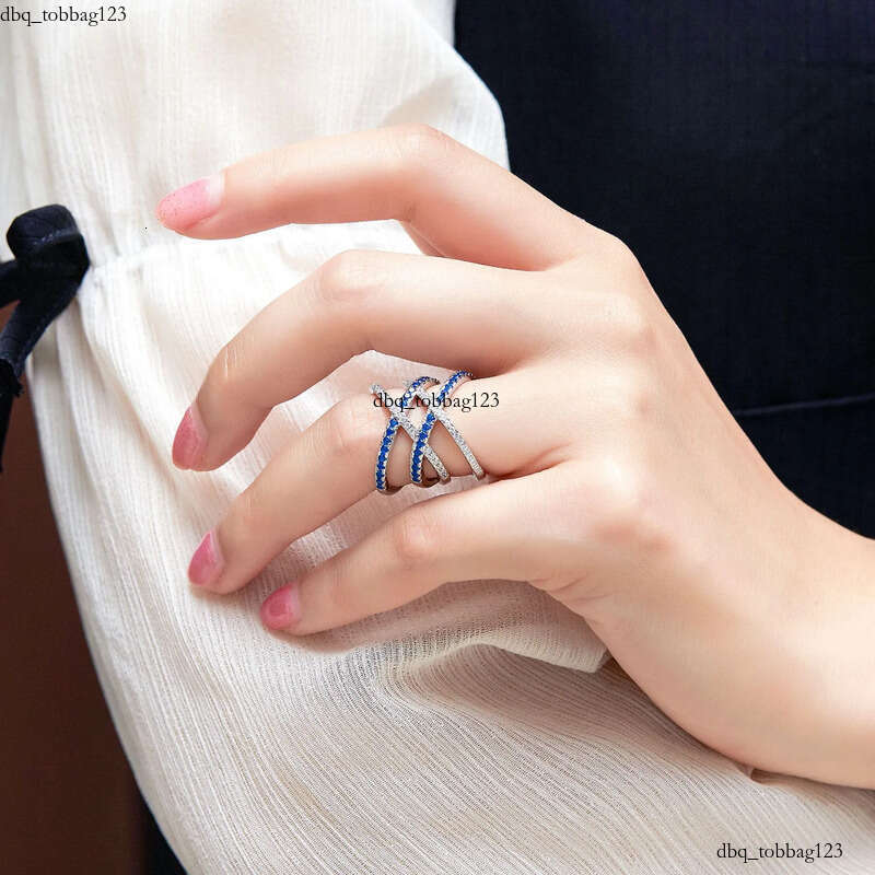2024 Drop Ship Ins Wedding Rings Jewelry Sterling Sier Bue Sapphire CZ Dia Gemstones Party Eternity Women Engagement Cross Ring For Lover Gift