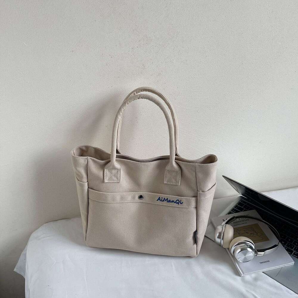 designer bag Luxury bag Large Capacity Commuter Canvas New Fashion Versatile Korean Design Handheld Shoulder Tote Bag