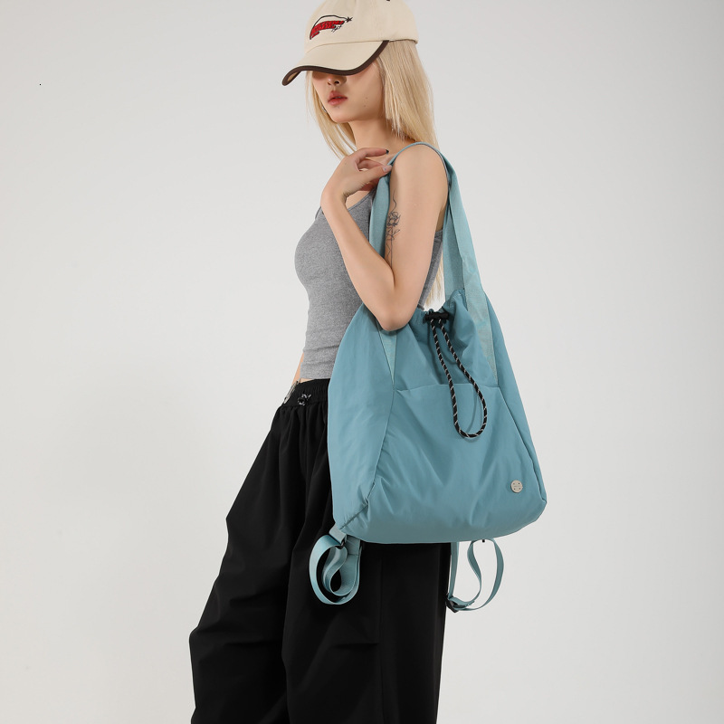 Designer drawstring pocket lightweight nylon shoulder bag 2025 new casual travel sports backpack