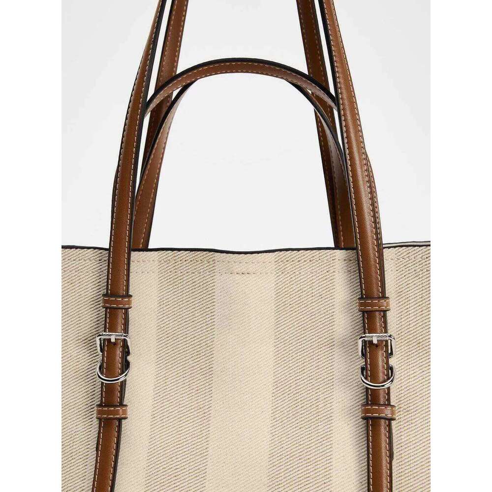 Large-capacity Canvas Female 2024 New Contrast Retro Portable Tote Commuting One-shoulder Messenger Bag in Class
