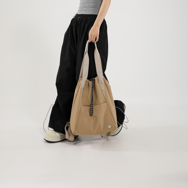 Designer drawstring pocket lightweight nylon shoulder bag 2025 new casual travel sports backpack