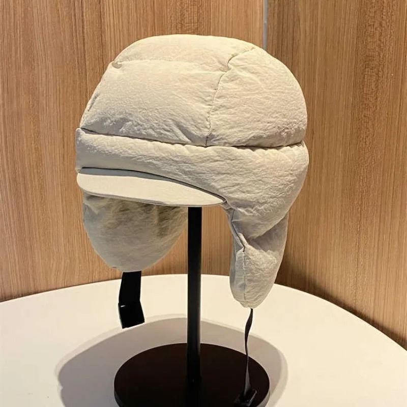 Autumn and Winter Solid Color Down Padded Lei Feng Cap for Men and Women Warmth Cycling Ear Protection Flying Bomber Hats Gorras 250930