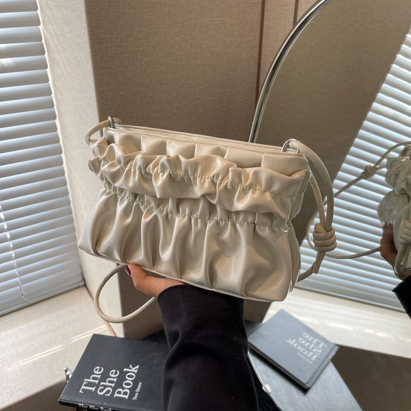 Designer bags pink portable shoulder bag women's 2024 summer new fashion versatile pleated cloud chain messenger bag