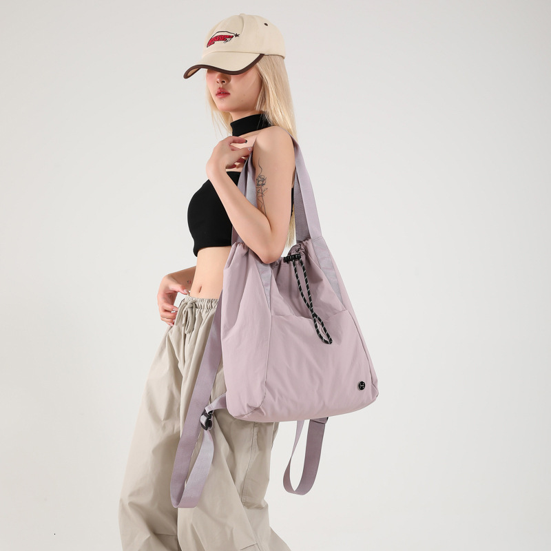 Designer drawstring pocket lightweight nylon shoulder bag 2025 new casual travel sports backpack