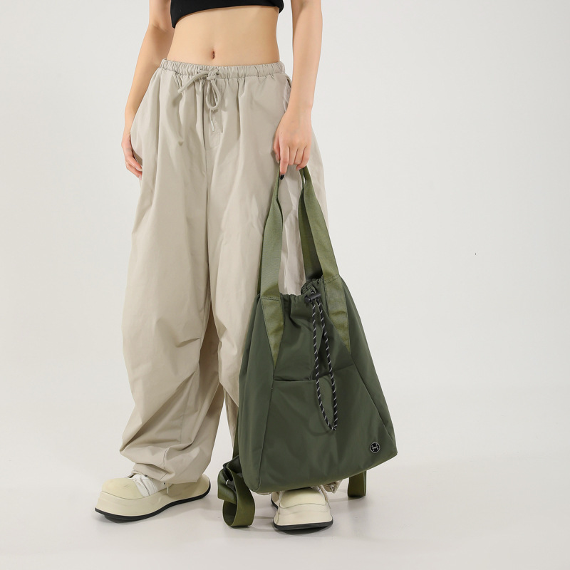 Designer drawstring pocket lightweight nylon shoulder bag 2025 new casual travel sports backpack