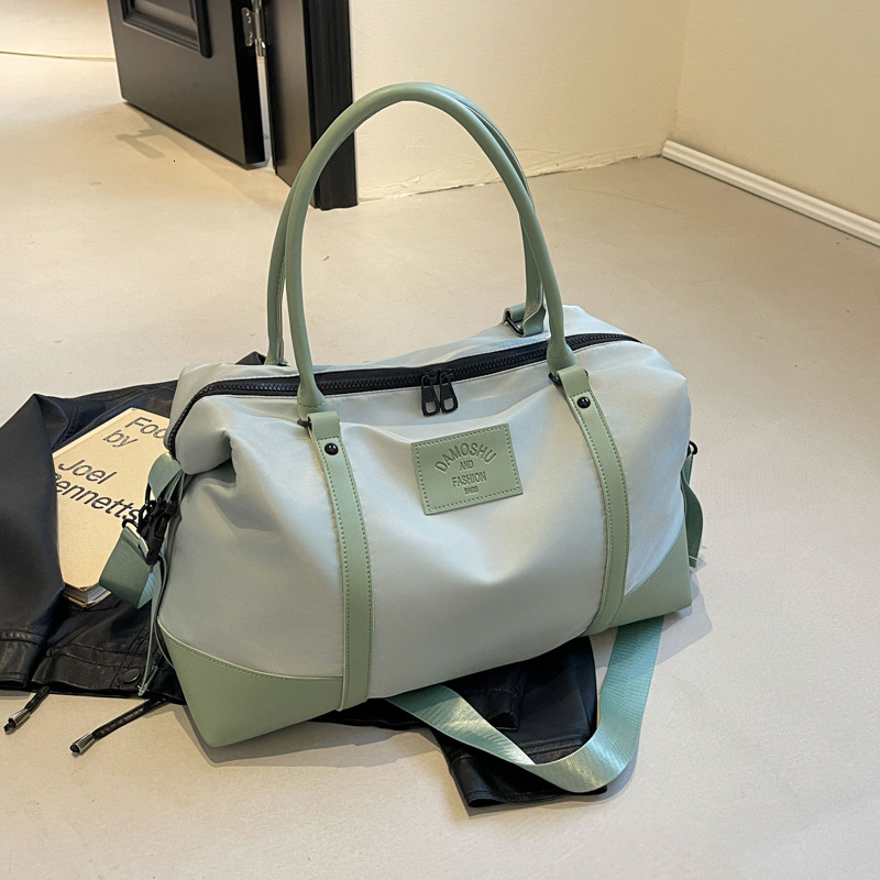 Designer 2025 new leisure travel bag, large capacity hand-held crossbody bag