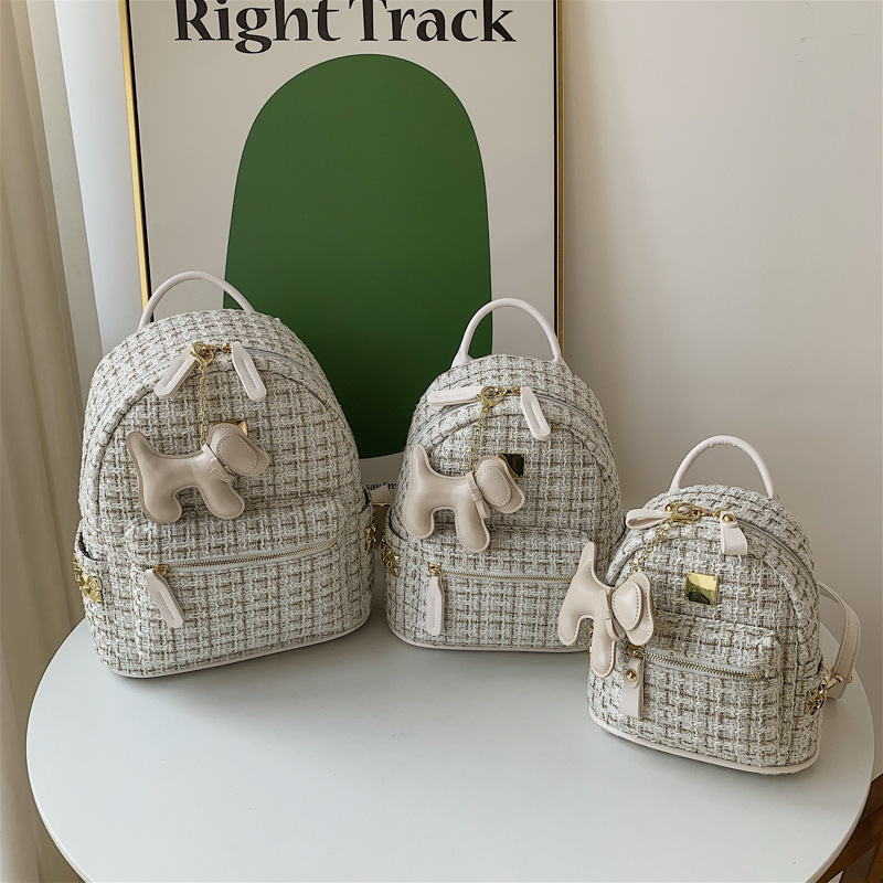 Designer bags autumn and winter woolen backpack 2023 new fashion French texture foreign style women's travel small backpack free pendant