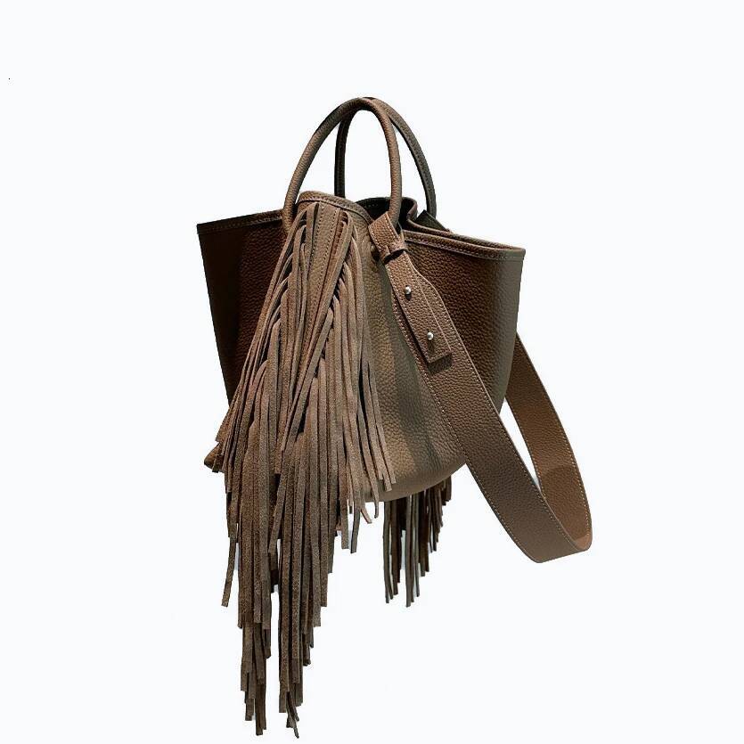 First layer cowhide tassel bucket new niche design large capacity commuter one-shoulder crossbody bag women's handbag high-quality