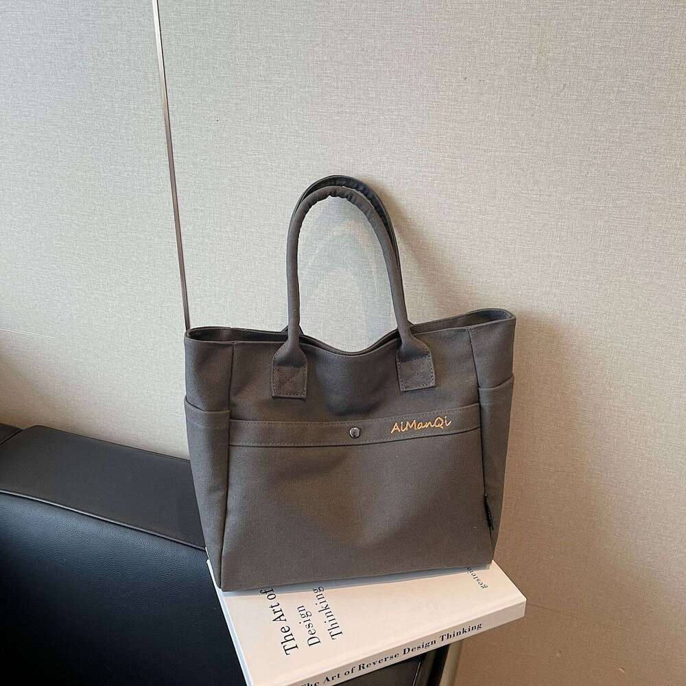 designer bag Luxury bag Large Capacity Commuter Canvas New Fashion Versatile Korean Design Handheld Shoulder Tote Bag