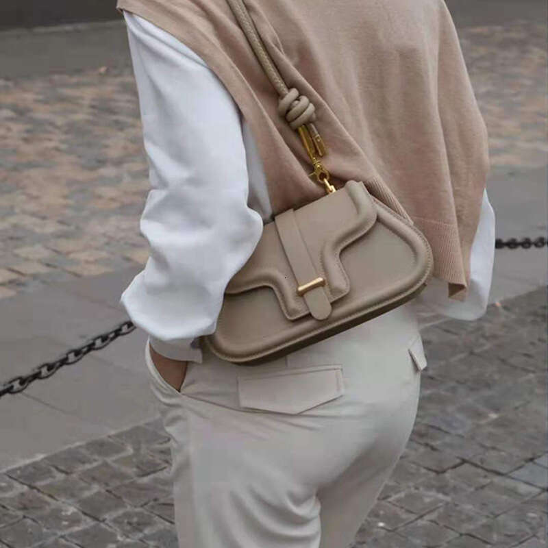 designer bag Luxury bag Women's Niche Design New Fashion Single Shoulder Drawstring Knot Motorcycle Casual Versatile Crossbody Bag for Women