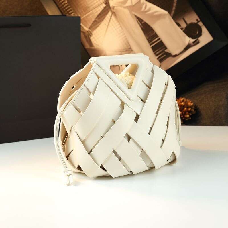 Luxury designer's new vegetable basket bucket leather handbag woven hollow women's fashionable shoulder crossbody bag