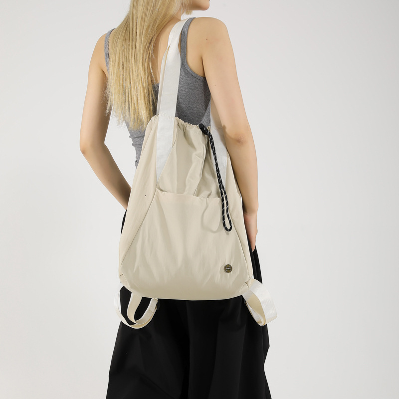 Designer drawstring pocket lightweight nylon shoulder bag 2025 new casual travel sports backpack