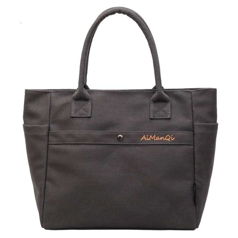 designer bag Luxury bag Large Capacity Commuter Canvas New Fashion Versatile Korean Design Handheld Shoulder Tote Bag