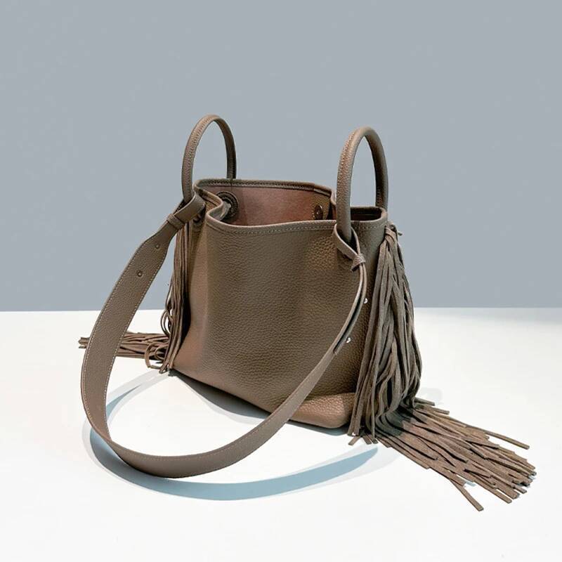 First layer cowhide tassel bucket new niche design large capacity commuter one-shoulder crossbody bag women's handbag high-quality