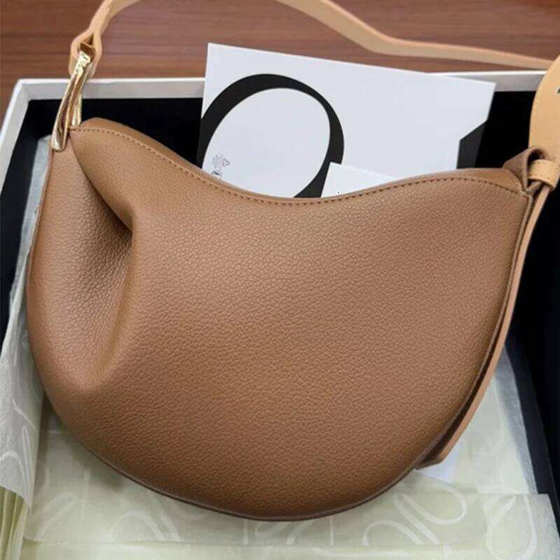 2025 women's new genuine leather shoulder crossbody pea bag, niche casual hand-held armpit bag