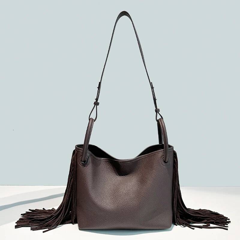 First layer cowhide tassel bucket new niche design large capacity commuter one-shoulder crossbody bag women's handbag high-quality