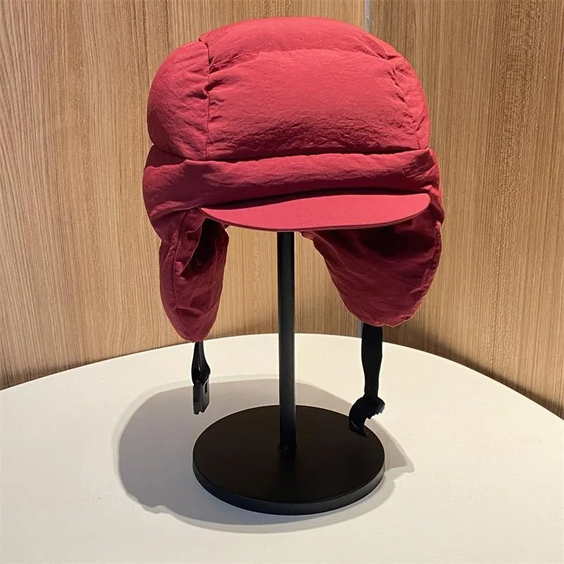 Autumn and Winter Solid Color Down Padded Lei Feng Cap for Men and Women Warmth Cycling Ear Protection Flying Bomber Hats Gorras 250930