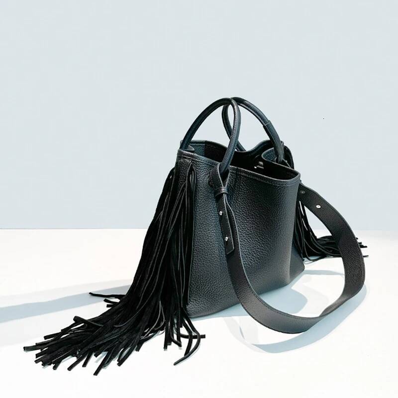 First layer cowhide tassel bucket new niche design large capacity commuter one-shoulder crossbody bag women's handbag high-quality