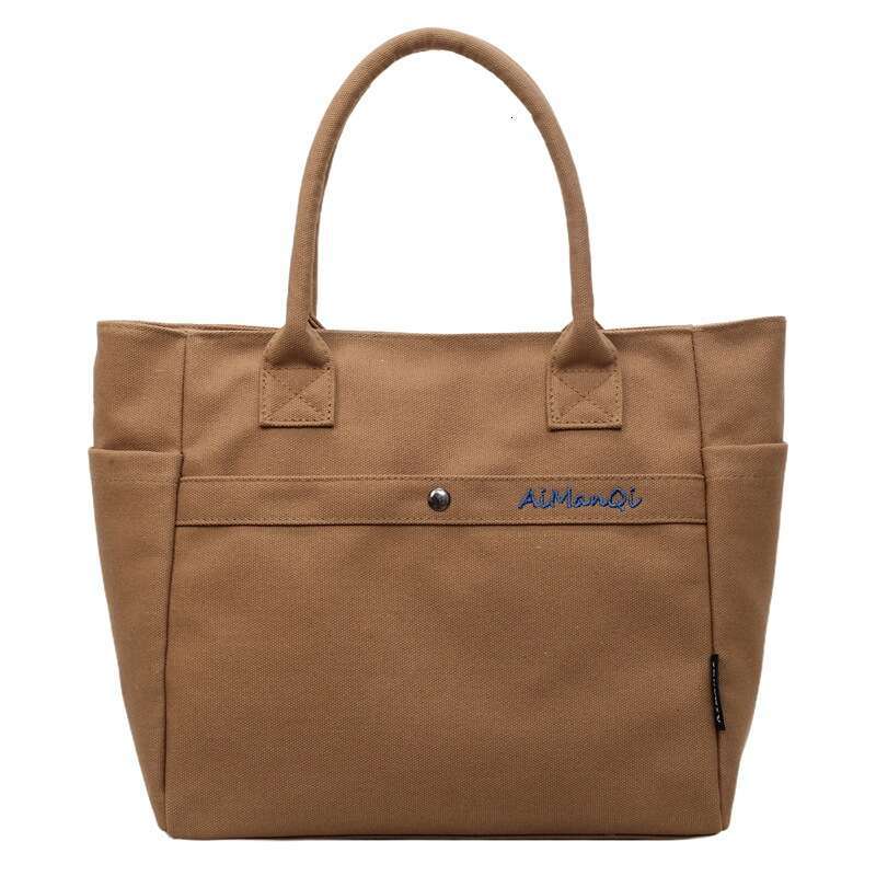 designer bag Luxury bag Large Capacity Commuter Canvas New Fashion Versatile Korean Design Handheld Shoulder Tote Bag