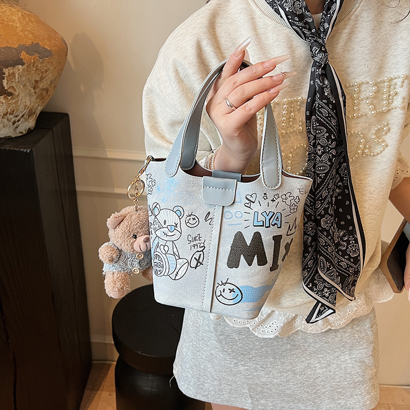 2025 Graffiti Women's Bucket Bag New Autumn/Winter Fashion Luxury Bag Elegant Retro niche Design Handbag Designer Bag