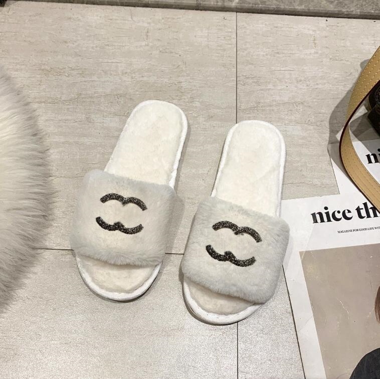 Fashion designer letter logo home shoes luxury cotton slippers European and American women's winter rhinestone anti slip warm home home and indoor fluffy slippers