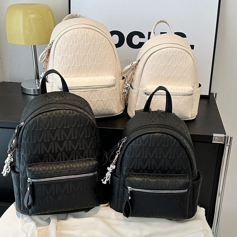 Luxury Bag Designer Bag 2025 New Women's Backpack British Style Embossed Letter Backpack Hong Kong Style Commuter Soft Leather Texture College St