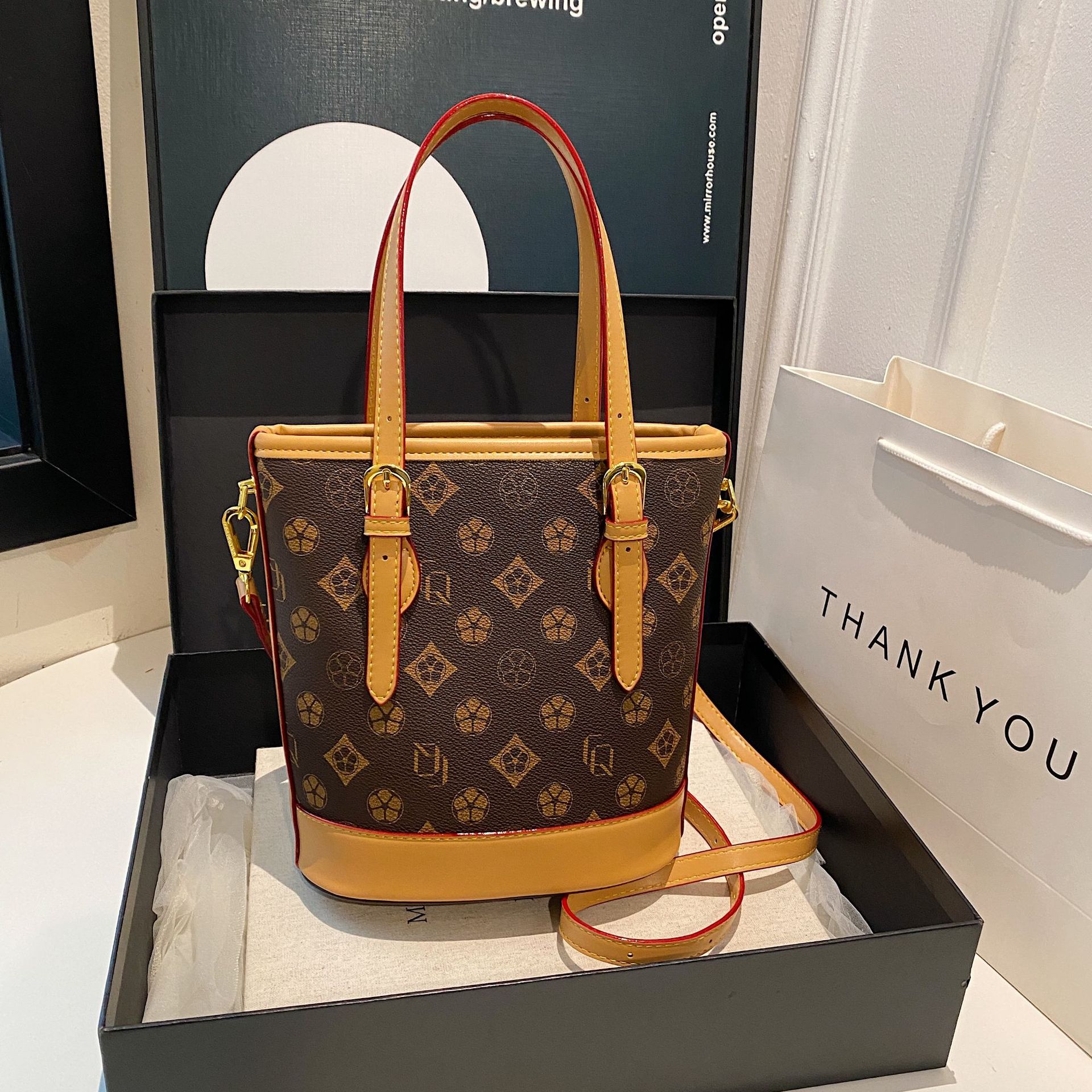 Free shipping Designer bag four-season retro floral simple niche and high-end fashionable women's hand-held crossbody bucket bag