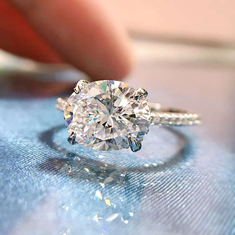 2025 Rulalei Brand New Top Sell Sparkling Lady Jewelry Geuine 100% Sterling Sier Oval Cut White Moissanite Dia Eternity Women Bridal Wedding Ring