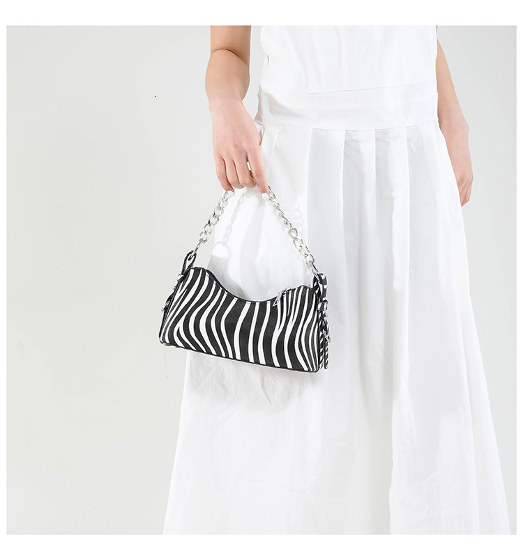 European and American style snake skin pattern women's fashionable armpit bag autumn and winter new item chain design retro luxury bag designer b
