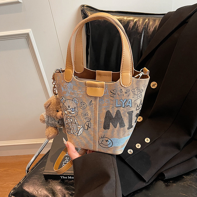 2025 Graffiti Women's Bucket Bag New Autumn/Winter Fashion Luxury Bag Elegant Retro niche Design Handbag Designer Bag