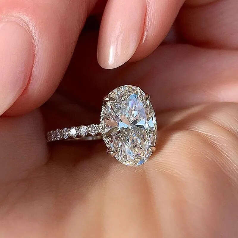 Huitan Oval Finger Dia Ring Band Dazzling Brilliant CZ Stone Four Prong Setting Classic Womens Wedding Rings Anniversary Gift For Wife&Girlfriend
