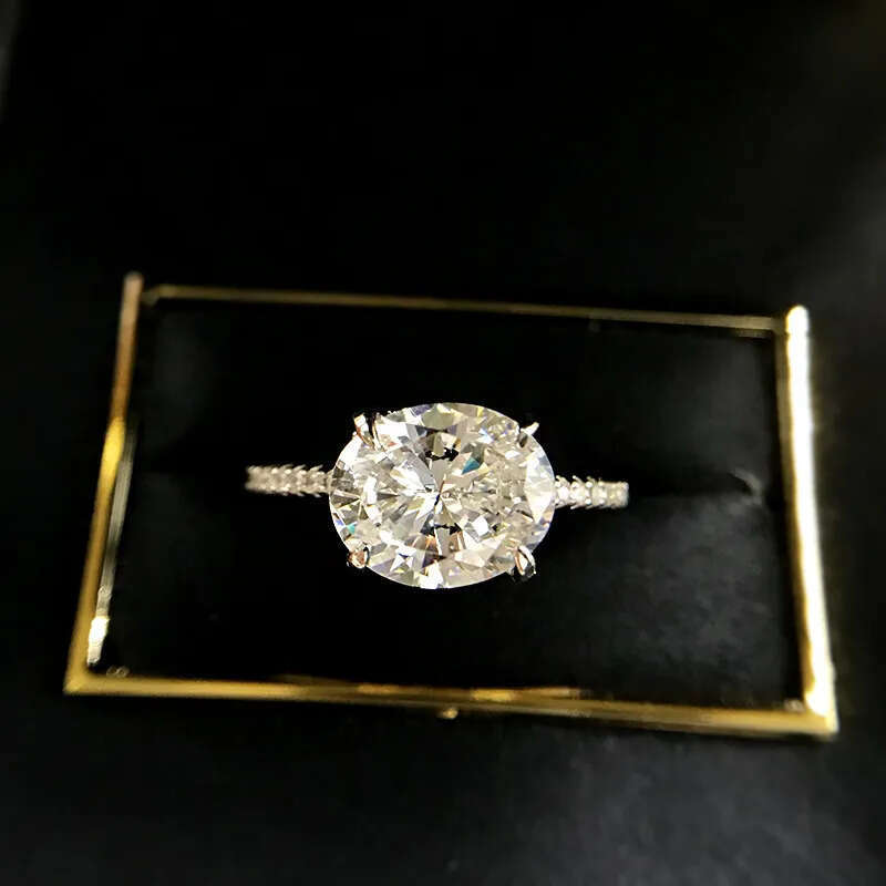 2025 Rulalei Brand New Top Sell Sparkling Lady Jewelry Geuine 100% Sterling Sier Oval Cut White Moissanite Dia Eternity Women Bridal Wedding Ring