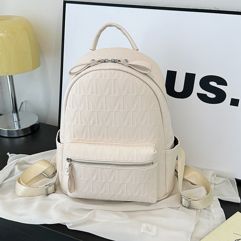 Luxury Bag Designer Bag 2025 New Women's Backpack British Style Embossed Letter Backpack Hong Kong Style Commuter Soft Leather Texture College St