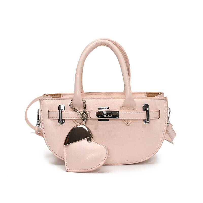 Ladies' fashionable solid color handbag autumn and winter new love pendant trendy luxury bag versatile niche style designer bag