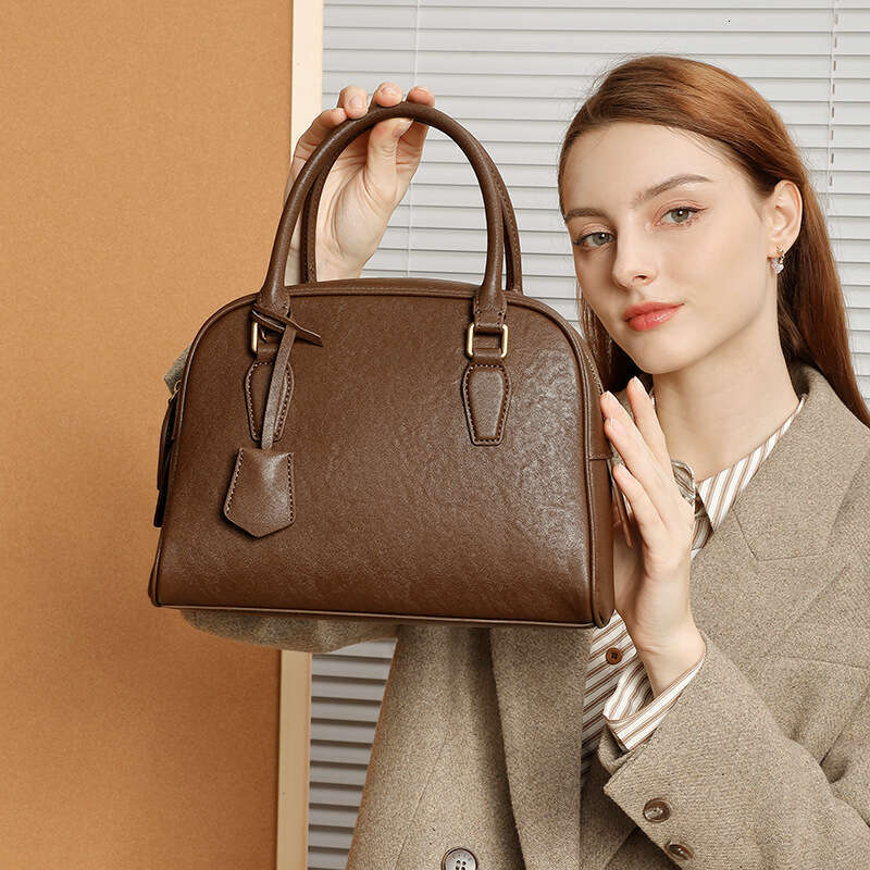 Luxury bag New Top Layer Cowhide Minimalist Boston Bowling Ball High end Genuine Leather Women s Large Capacity Handbag Pillow Bag