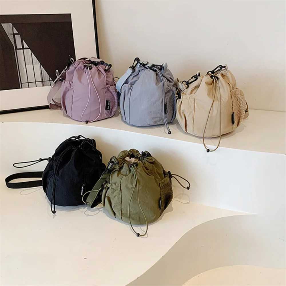 New Fashion Drawstring Shoulder Bag Nylon Bucket Crossbody Bags Women Men Travel Casual Large Capacity Waterproof Handbags 2025T251007