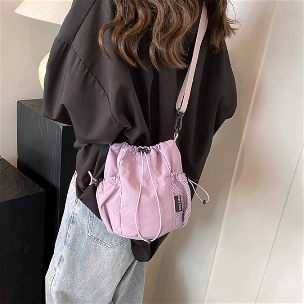 New Fashion Drawstring Shoulder Bag Nylon Bucket Crossbody Bags Women Men Travel Casual Large Capacity Waterproof Handbags 2025T251007