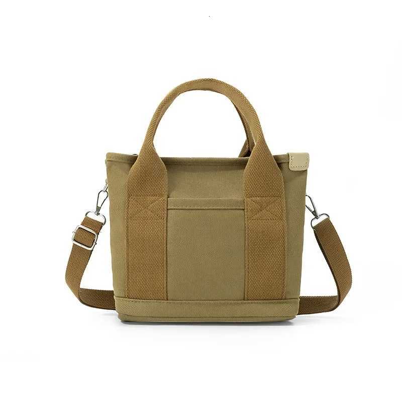 HighEnd Canvas Bento Box Handbag Womens Handheld Bag Soft Fabric Fashionable Design with Phone Pocket And Zipper ClosureT251007