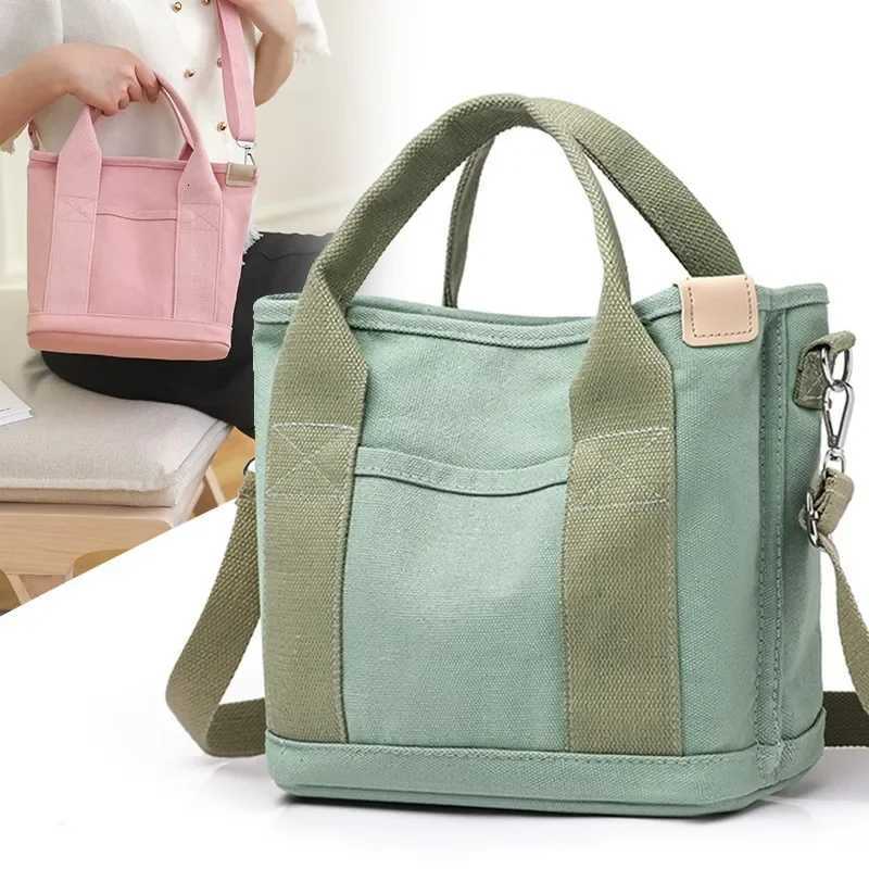 HighEnd Canvas Bento Box Handbag Womens Handheld Bag Soft Fabric Fashionable Design with Phone Pocket And Zipper ClosureT251007