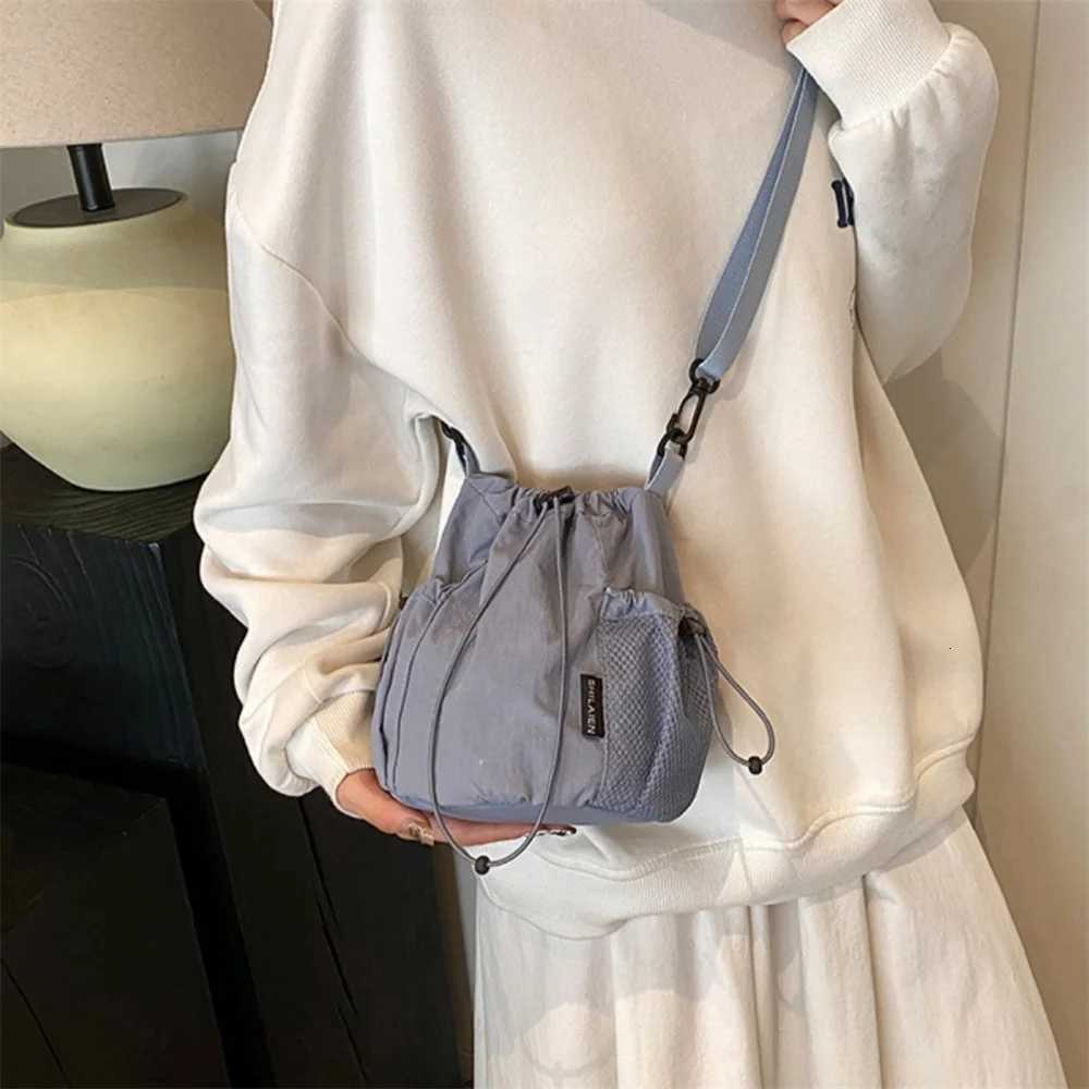 New Fashion Drawstring Shoulder Bag Nylon Bucket Crossbody Bags Women Men Travel Casual Large Capacity Waterproof Handbags 2025T251007