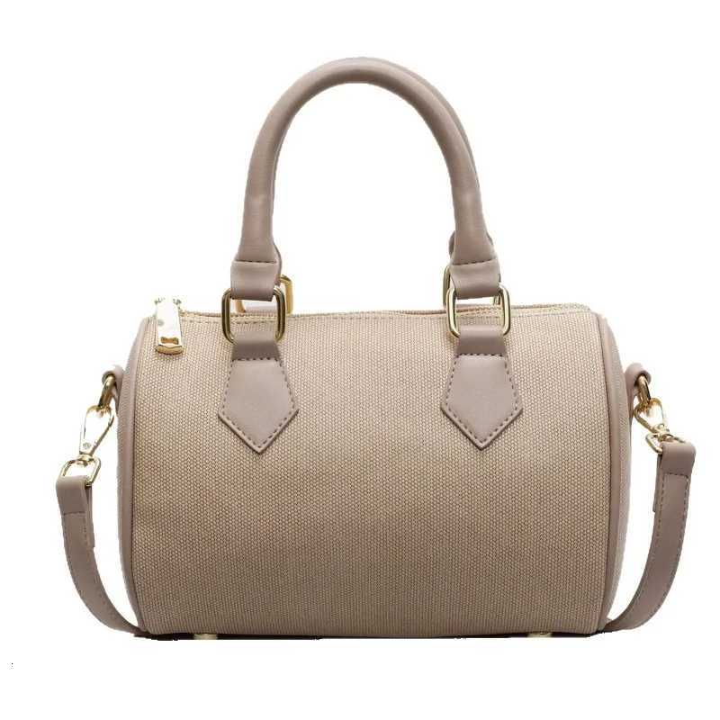 Designer Ladies fi casual versatile handbag large exquisite lock pure color highend sense bag bag daily work shoder bag Y251120